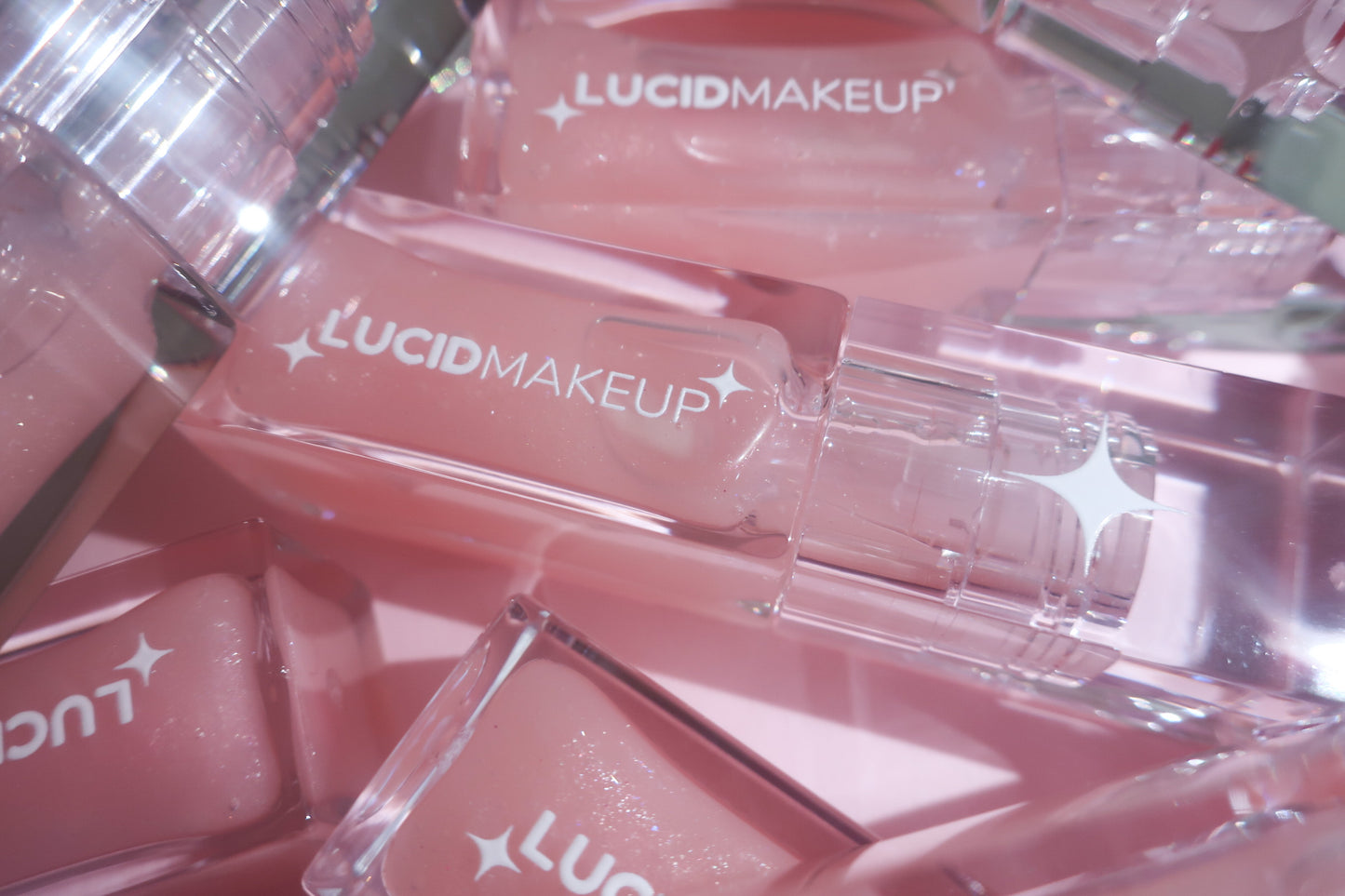 HER MAGIC LIPGLOSS