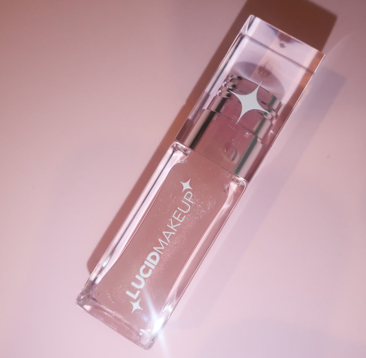 HER MAGIC LIPGLOSS